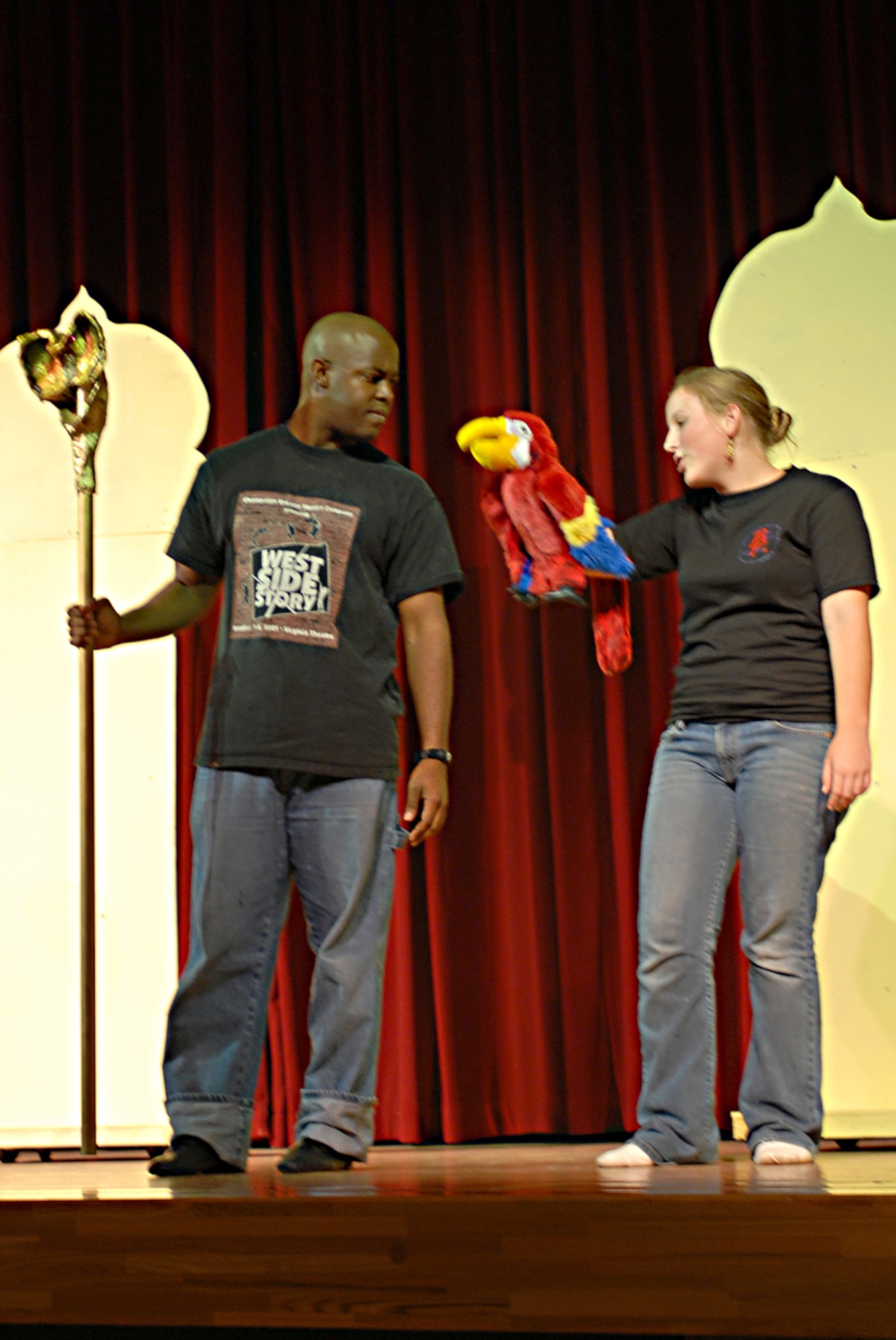 Senior Airman Jamaal Solomon (left), 18th Logistic Readiness Squadron, plays the part of the evil Vizier Jafar and Ashleigh Stebbins (right) plays the part of Lago during a rehearsal of Disney’s “Aladdin Jr.”
(U.S. Air Force photo/Airman 1st Class Kasey Zickmund)
