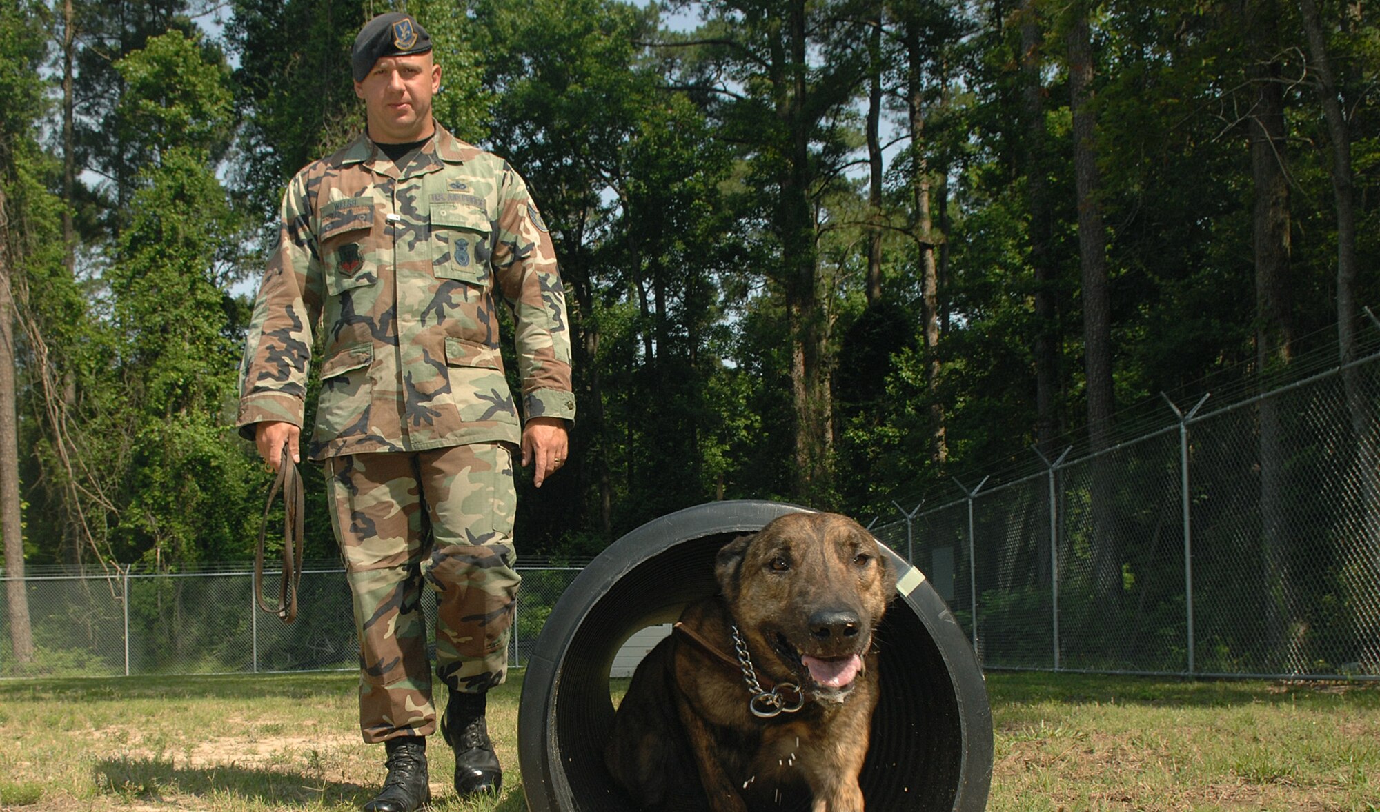 Staff Sgt. Geoffrey M. Welsh is a security forces military working dog handler assigned to the 4th Security Forces Squadron at Seymour Johnson AFB, N.C. He has been selected as one of the 12 Outstanding Airmen of the Year. While deployed to Iraq, he played a critical role in K-9 improvised explosive device detection on more than 100 combat missions.  He engaged in a 45-minute firefight against enemy combatants and saved the life of his platoon sergeant who was hit by sniper fire. In addition, his entry point searches led to the confiscation of 250 cell phones, more than 1,000 media storage devices, 20 digital cameras and a base map, ensuring the security of the installation and keeping people safe. (U.S. Air Force photo)