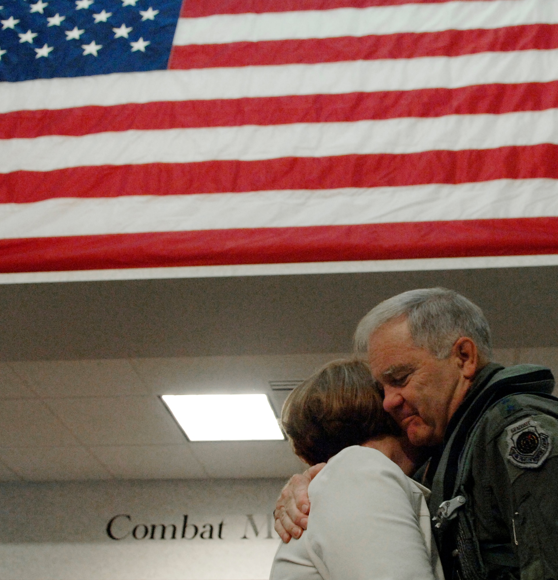 LANGLEY AIR FORCE BASE, Va. -- Gen. Ronald E. Keys, commander of Air Combat Command, hugs his wife, Valerie, before departing on the final flight of his Air Force career here Sept. 28. General Keys retires from the Air Force Nov. 1, ending four decades of military service. (U.S. Air Force photo/Airman 1st Class Vernon Young)