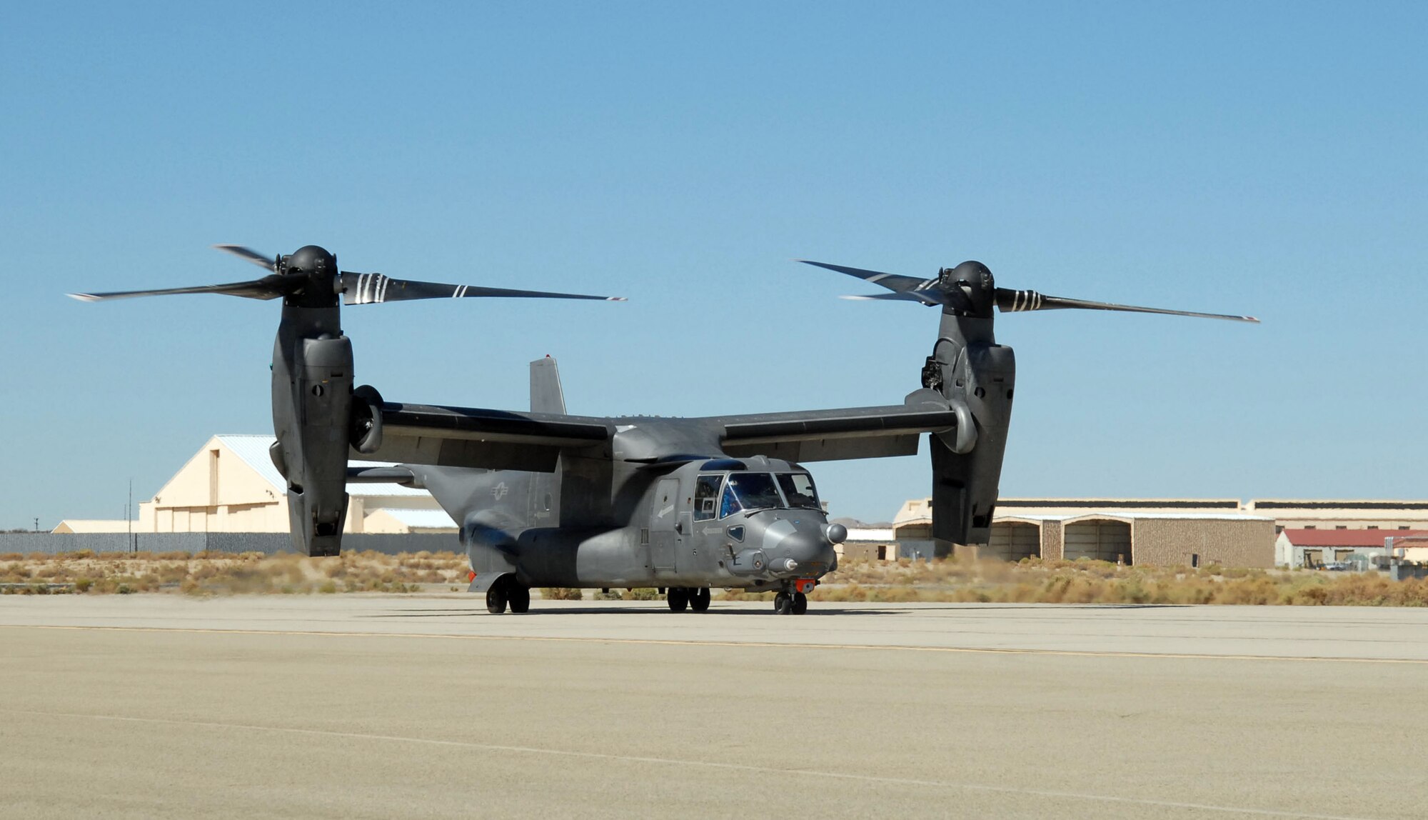 A CV-22 Osprey prepares to take off on the Edwards flightline. The CV-22 Integrated Test Team concluded developmental testing here Sept. 26. The CV-22 program is now moving to the operational test phase, which will continue at Hurlburt Field, Fla., in October. (Photo by Senior Airman Jason Hernandez)