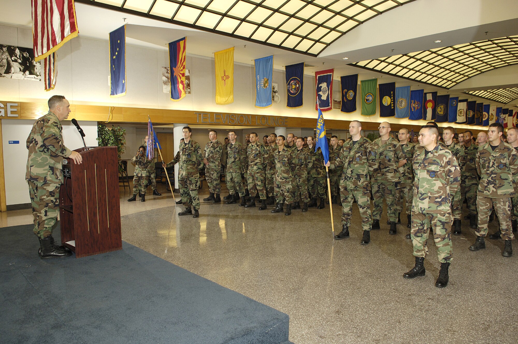 Col. Rick Martin, 305th Air Mobility Wing commander, addresses the 305th Mission Support Group at the Passenger Terminal here Sept. 27. Colonel Martin will relinquish command to Col. Balan Ayyar, 319th Air Refueling Wing, Grand Forks Air Force Base, N.D., during a change of command ceremony here Oct. 2. (U.S. Air Force photo/Kenn Mann)
