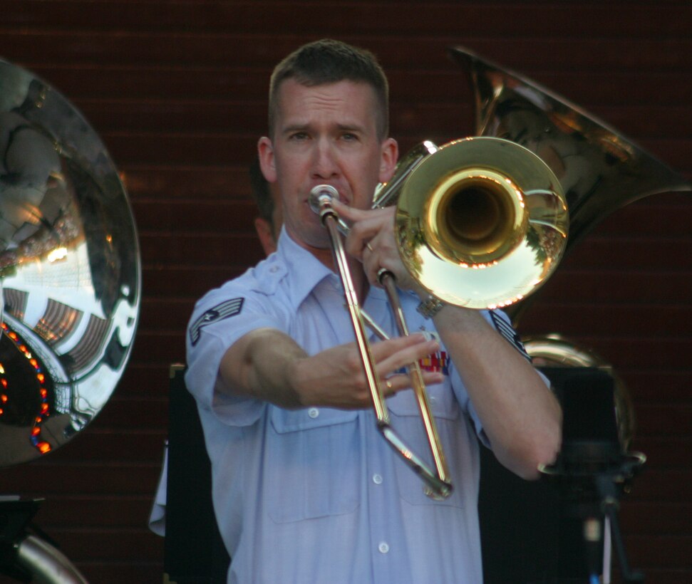 SSgt Ben Kadow of the USAF Heartland of America Band performs the virtuosic trombone solo, The Blue Bells of Scotland, with the Brass in Blue at a summer concert in Glenwood, IA.
