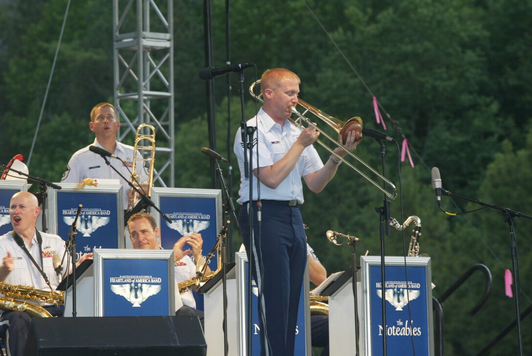 A1C Josh Keen of the USAF Heartland of America Band solos with The Noteables jazz ensemble in front of a crowd numbering in the tens of thousands.  The Noteables performed as part of the Salute to the Troops at Stone Mountain, Georgia over the Memorial Day weekend.