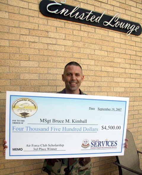 Master Sgt. Bruce Kimball, 349th Recruiting Squadron, won third place and a $4,500 scholarship in the Air Force Club's recent essay contest. The contest was open to club members Air Force wide and a total of $25,000 in scholarship money was awarded to winners. (Air Force photo by Julie Rich)