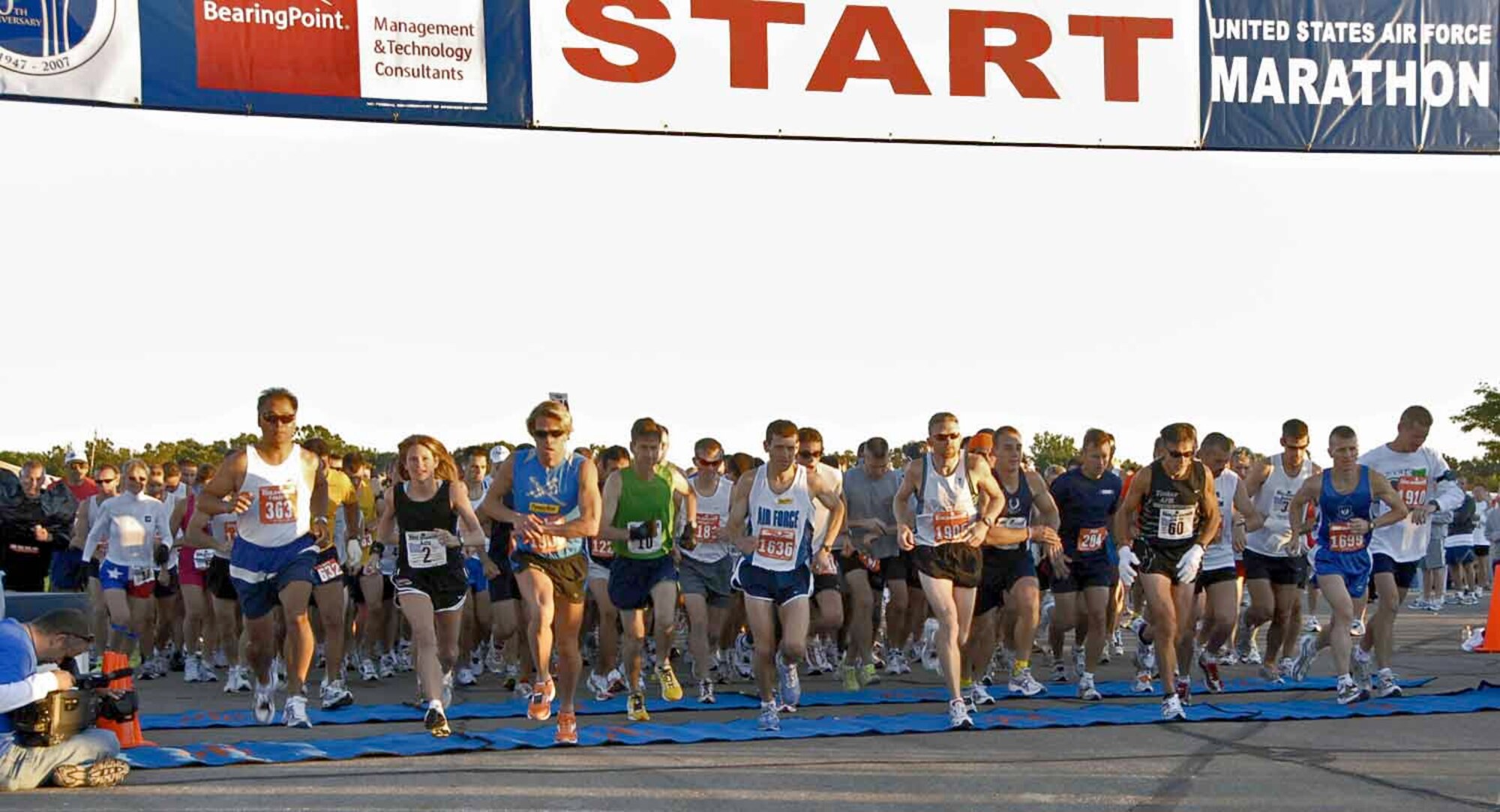 Marathoners take off for the 11th annual U.S. Air Force Marathon Sept. 15 at Wright-Patterson Air Force Base, Ohio. Josh Cox (third from left) won the event with a record-breaking time of 2:20:57. More than 6,300 runners participated in five marathon events. (Air Force photo by Christy Webb)