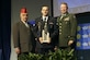 Senior Airman Robb Hulet stands with the National Commander of The American Legion, Paul Morin, and General Charles Campbell, United States Army Forces Command, during the 2007 American Legion Spirit of Service Award presentation ceremony in Reno, Nev. Aug. 28. Airman Hulet, 3rd Equipment Maintenance Squadron, was the Air Force recipient of the annual award recognizing outstanding military professionals who are actively involved with volunteer projects in the community.