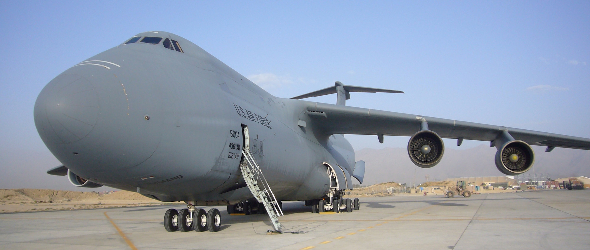 A C-5 Galaxy lands at Bagram Air Base, Afghanistan, without interruption to flight operations for the first time Sept. 22. (U.S. Air Force photo/Master Sgt. Jamie Cabral)