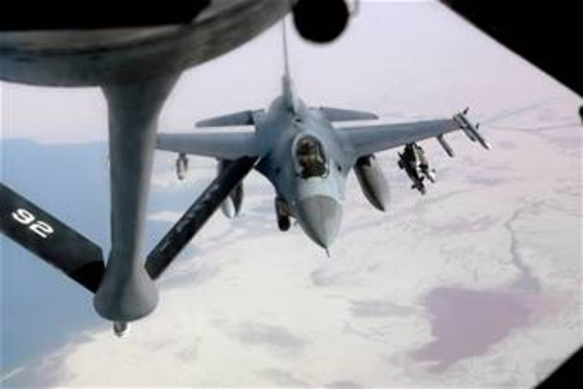 An F-16 Fighting Falcon approaches a KC-135 Stratotanker over central Iraq to refuel while supporting Operation Iraqi Freedom. (U.S. Air Force photo/Senior Airman Erik Hofmeyer)