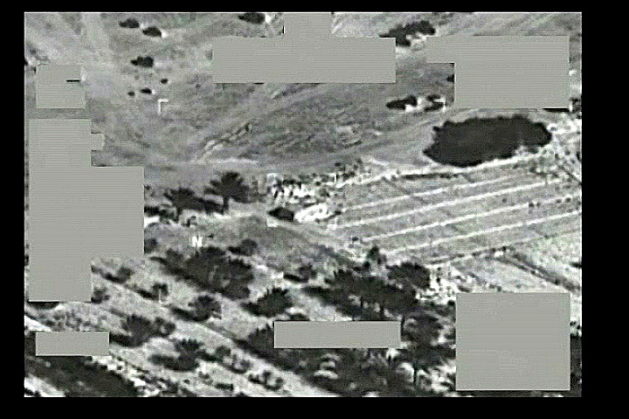Weapon systems video still photographs show before and after shots following an airstrike Sept. 25 by an Air Force F-16 Fighting Falcon.  The strike resulted in the death of Abu Nasr al-Tunisi and two other key al-Qaida operatives in Iraq. (U.S. Air Force photo)