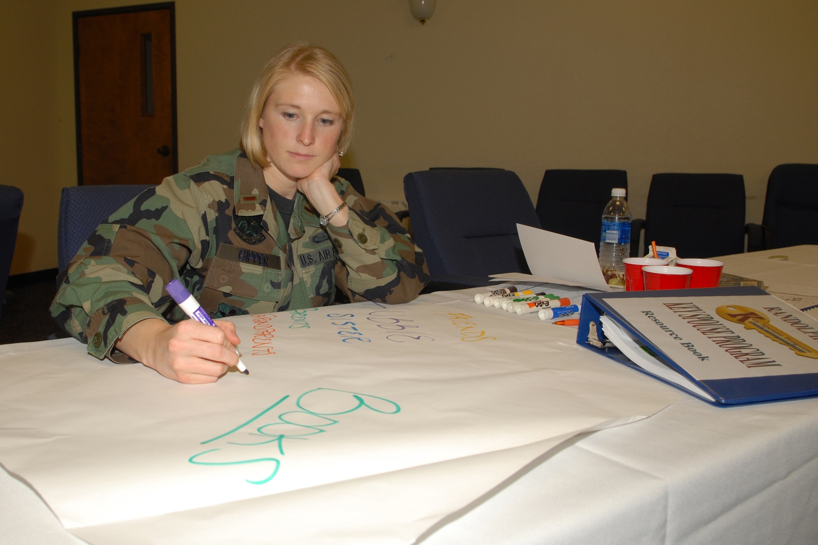 Second Lt. Kirstin Gipper, 12th Operations Support Squadron, participates in an activity during the Key Spouse’s training Sept. 18.
