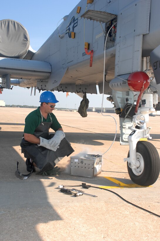 Adam Martin, 442d Aircraft Maintenance Squadron, purges the liquid oxygen system on A-10 aircraft Sept. 17. The system provides oxygen for the pilot to prevent hypoxia or oxygen starvation. (U.S. Air Force photo/Tech. Sgt. Samuel A. Park) 