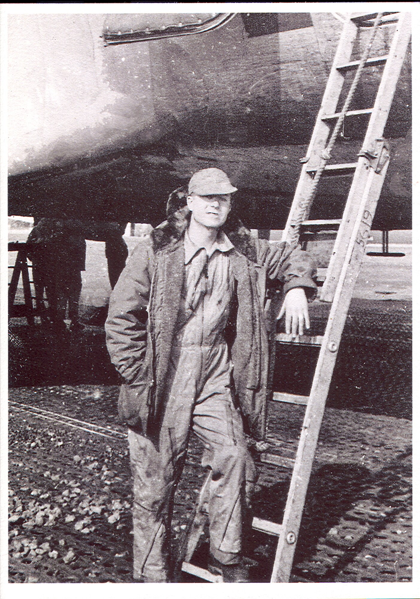 Retired Chief Master Sgt. Wallace Liggett stands next to a C-54 cargo aircraft in the midst of the Berlin Airlift. He was a crew chief and flew 105 missions into Berlin as part of the largest airlift in history at the time. Over the course of his career, he
witnessed and took part in many historical events of the Air Force, becoming one of the service’s first senior and then chief master sergeants. (courtesy photo)