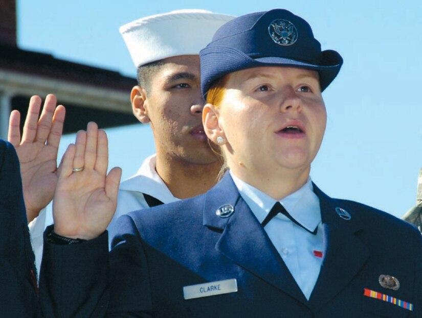 Airman Clarke recites the Oath of allegiance during the naturalization ceremony Sept. 23. (US Air Force/Bobby Jones)