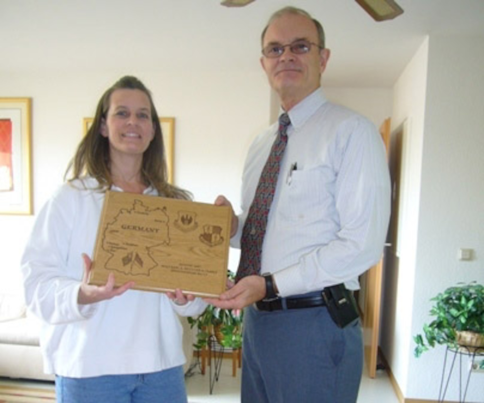 SPANGDAHLEM AIR BASE, Germany -- The Spangdahlem balcony of the month belonged to Maj. Craig McCluer and family, who were recognized by Richard Zumbehl, 52nd Mission Support Group. Major McCluer is a member of the 52nd Aerospace Medicine Squadron. (Courtesy photo)