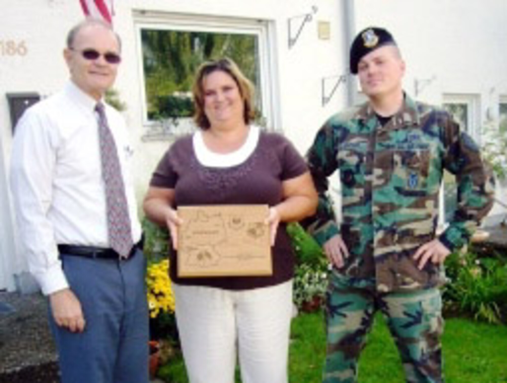 SPANGDAHLEM AIR BASE, Germany -- The Speicher Yard of the month belonged to Tech. Sgt. Kenneth Gentner and family, who were recognized by Richard Zumbehl, 52nd Mission Support Group. Sergeant Gentner is a member of the 52nd Security Forces Squadron. (Courtesy photo)