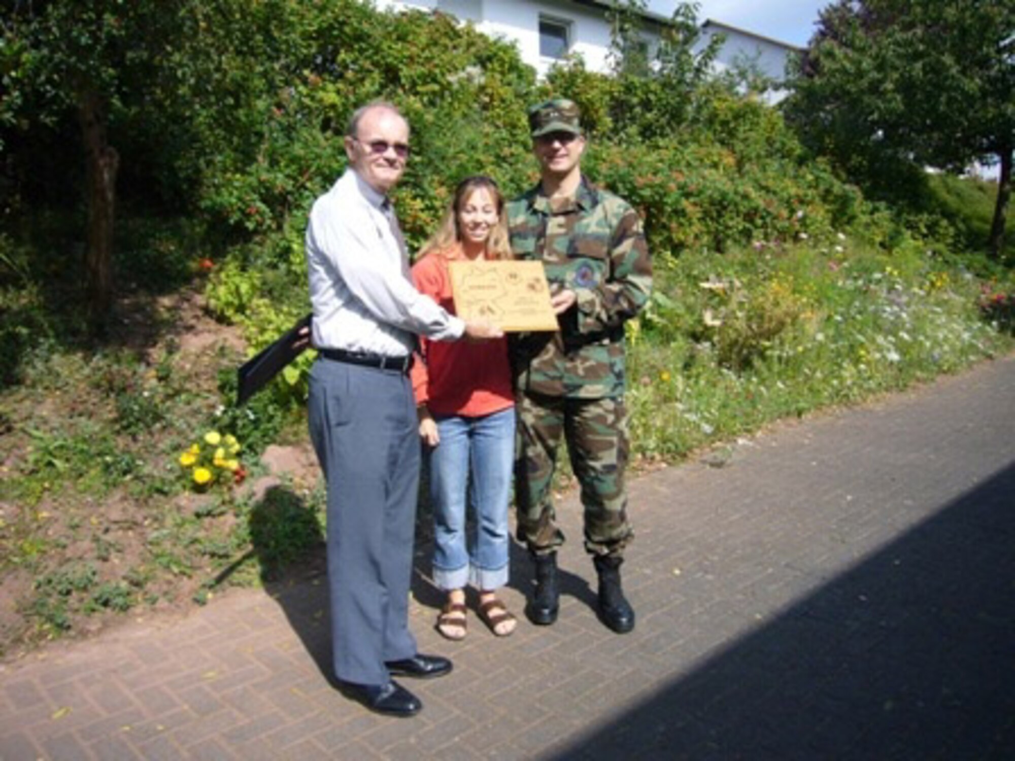 SPANGDAHLEM AIR BASE, Germany -- The Binsfeld yard for the month of August belonged to Capt. Cory Stegmeier and family, who were recognized by Richard Zumbehl, 52nd Mission Support Group. Captain Stegmeier is a member of the 23rd Fighter Squadron. (Courtesy photo)