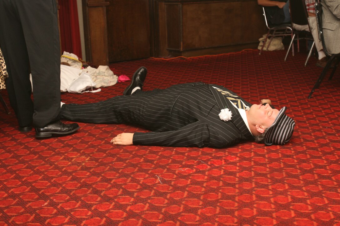 Frankie, played by Gunther Kusior, lies dead after being shot. He plays the role of an employee of Eddie "Longlaces" Shoeleone.
