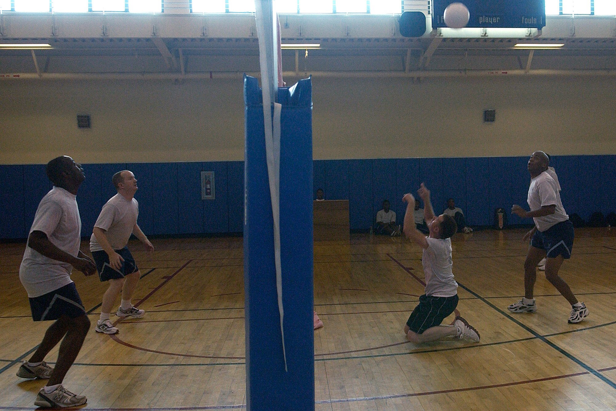 KUNSAN AIR BASE, South Korea - The 8th Mission Support Squadron team and the 8th Aircraft Maintenance Squadron compete in a blind volley ball game Sept. 28 here. The two teams alongs with others participated in a number of events during the 8th Fighter Wing Sports Day.  (U.S. Air Force photo/SrA Giang Nguyen)                               