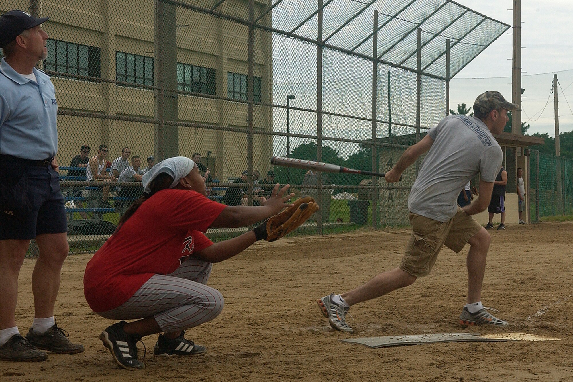 KUNSAN AIR BASE, South Korea - Airman 1st Class Brandon Richards, 8th Security Forces Squadron, gets a hit during the softball one-pitch tournament Sept. 28 here. Airman Richards, along with others, participated in a number of events during the 8th Fighter Wing Sports Day. (U.S. Air Force photo/SrA Giang Nguyen)                               