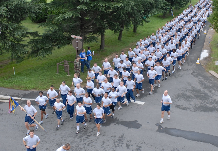 KUNSAN AIR BASE, South Korea - Airmen of the 8th Civil Engineer Squadron kick off sports day with a Wing Fun Run Sept. 28 here. The sports day allows Airmen a way to compete in friendly and fun competitions, helping to build esprit de corps. The wing run was followed by events, ranging from a Texas Hold 'Em tournament to unit paintball challenges. (U.S. Air Force photo/Staff Sgt Darcie Ibidapo)