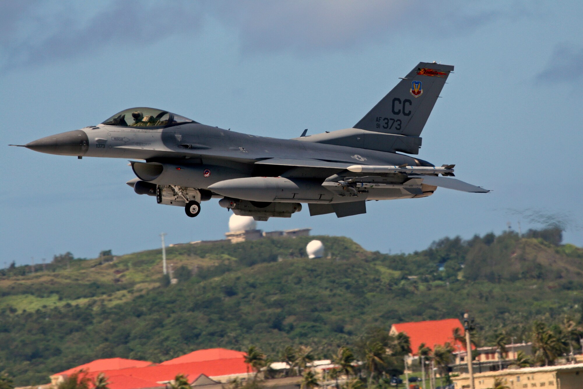 An F-16 Fighting Falcon from the 522 EFS, the Fireballs, takes off from Andersen Air Force Base, Guam. This is the last deployment for the Fireballs as well as their home station of the 27th Fighter Wing at Cannon Air Force Base. The Fireballs began their history in the skies over the Pacific Ocean during World War II and have come full circle by having their final deployment in the same area. The Fireballs will be inactivated after their return to home station. (Air Force photo/Senior Master Sgt. Mahmoud Rasouliyan)

