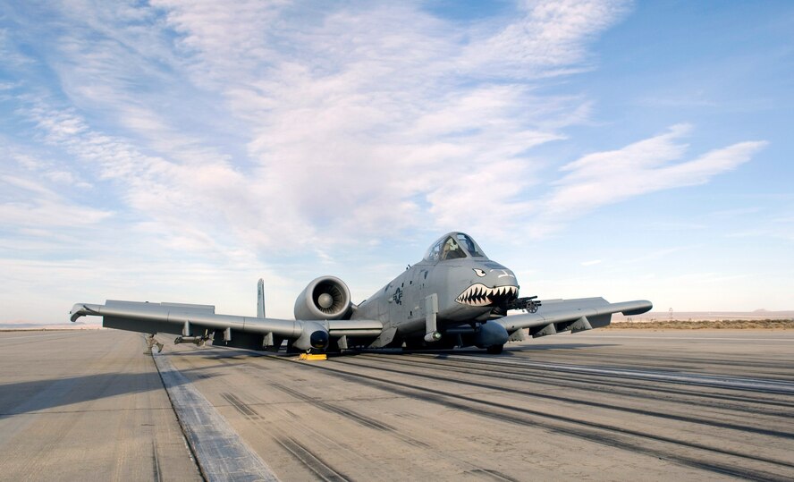 An A-10 sits on the runway after making an emergency landing March 25 at Edwards Air Force Base, Calif. The A-10 touched down with its landing gear in the up position after declaring an in-flight emergency. The pilot was not harmed. The aircraft, assigned to the 75th Fighter Squadron at Moody AFB, Ga., was participating in a Green Flag sortie out of Nellis AFB, Nev. (U.S. Air Force photo/Brad White) 
