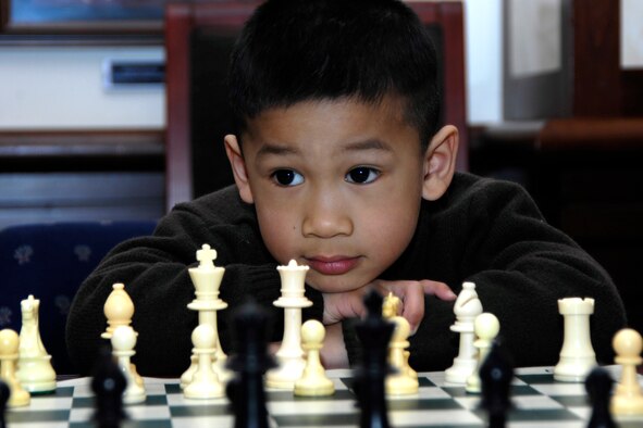HANSCOM AFB, Mass. – Ethan Dolosa watches and waits for his opponent’s next move during the Air Force Chess Tournament held at the Minuteman Club on March 29.  

First place winners included: Capt. Lorenzo Gabiola in the Air Force Active Duty category; Frank Waldron in the civilian DoD category; James Comerford in the age 13 to 18 category; Lindsey Stutz in the age 9 to 12 category and Elijah Dolosa in the 6 to 8 year old category. (U.S. Air Force photo by Linda LaBonte Britt)

