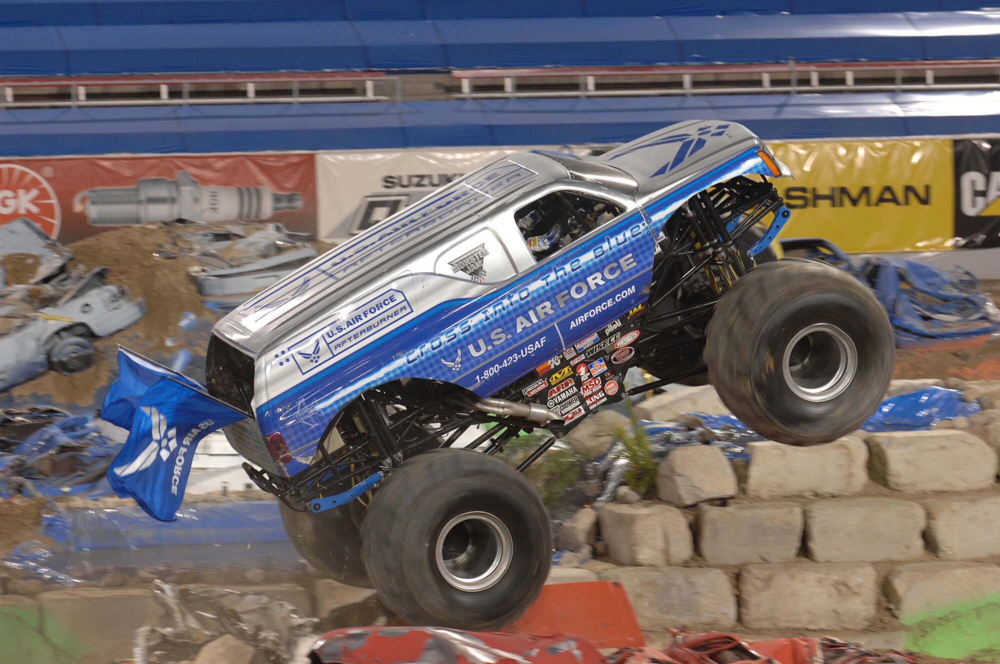 Damon Bradshaw, driver of the U.S. Air Force Afterburner monster truck, rumbles through the obstacle course the Monster Jam World Finals in Las Vegas, Nev., March 29, 2008.
(U.S. Air Force Photo/Senior Airman Larry E. Reid Jr.)
(Released)