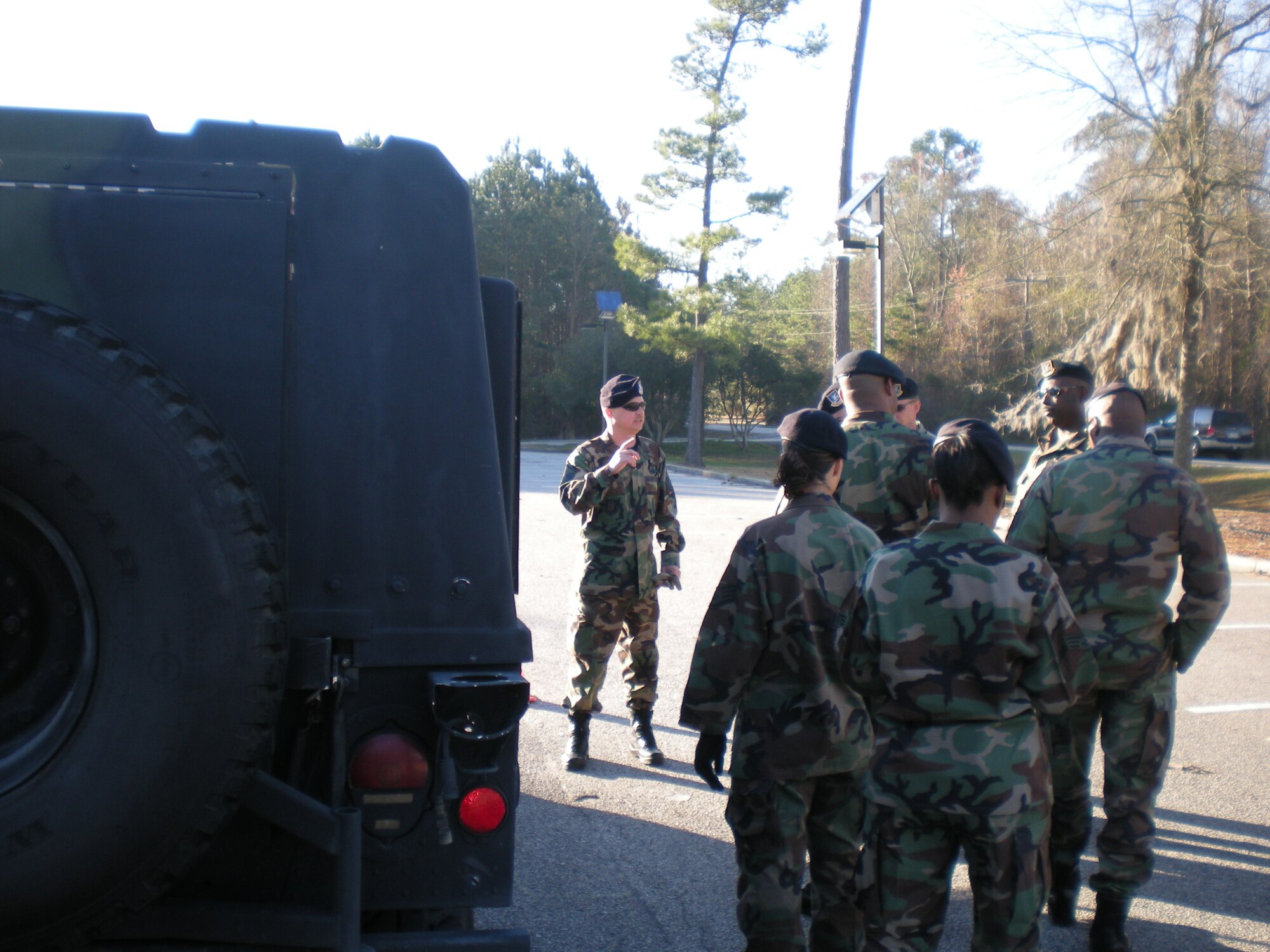 Master Sgt. Jerry Henning, 315 Security Forces Squadron, Charleston Air Force Base, S.C., talks to security forces members about proper procedures for driving the Humvee.  MSgt Henning held a course over the March UTA weekend to allow members to have hands on operation on maneuvering and precision driving for the Humvee. 