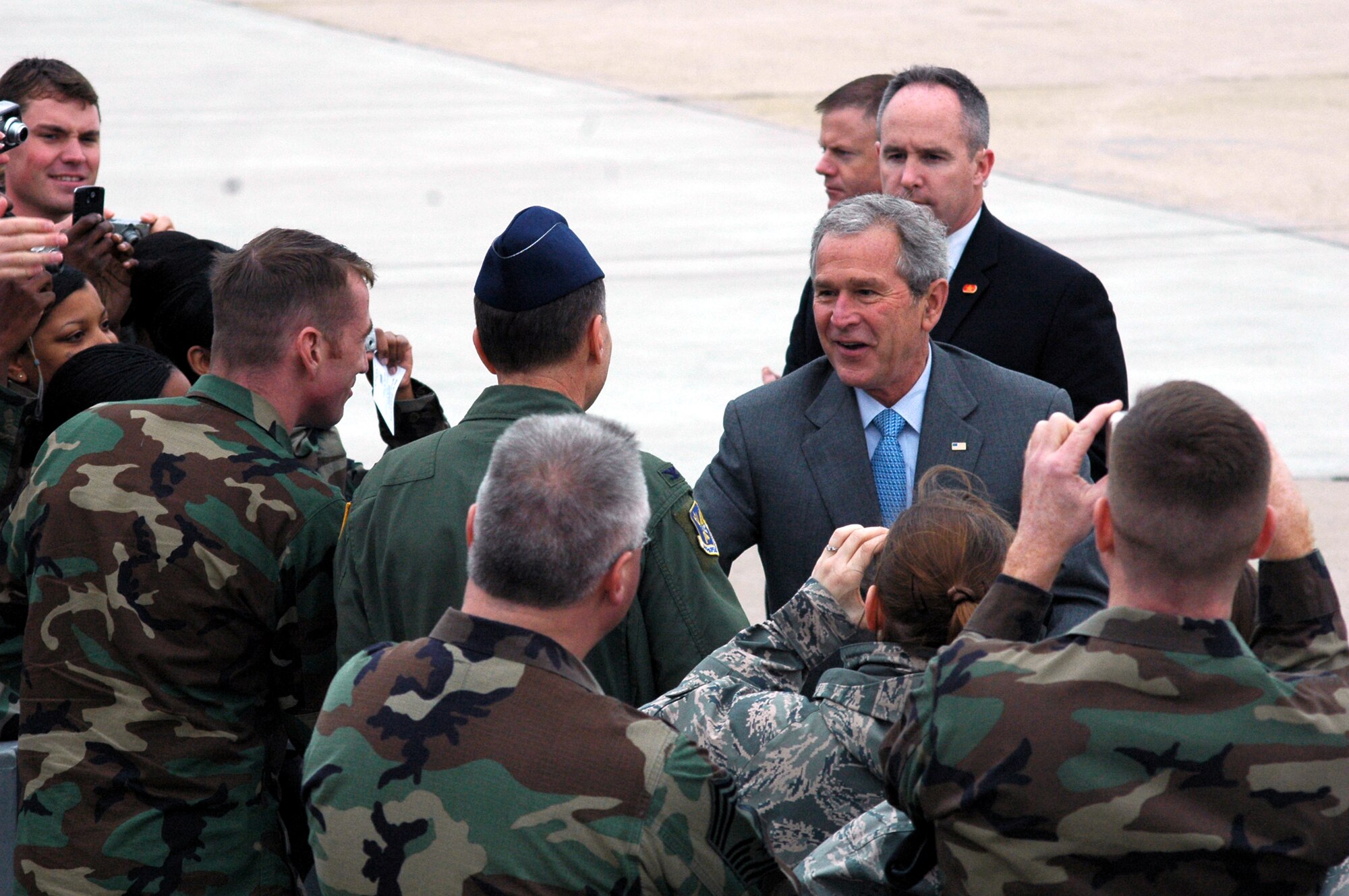 President of the United States George Bush shakes hands and greets Airmen at McGuire Air Force Base, N.J., March 28, 2008.  The President came through McGuire en route to a pre-scheduled visit to Freehold, N.J.  (U.S. Air Force Photo/Tech. Sgt. Scott T. Sturkol)