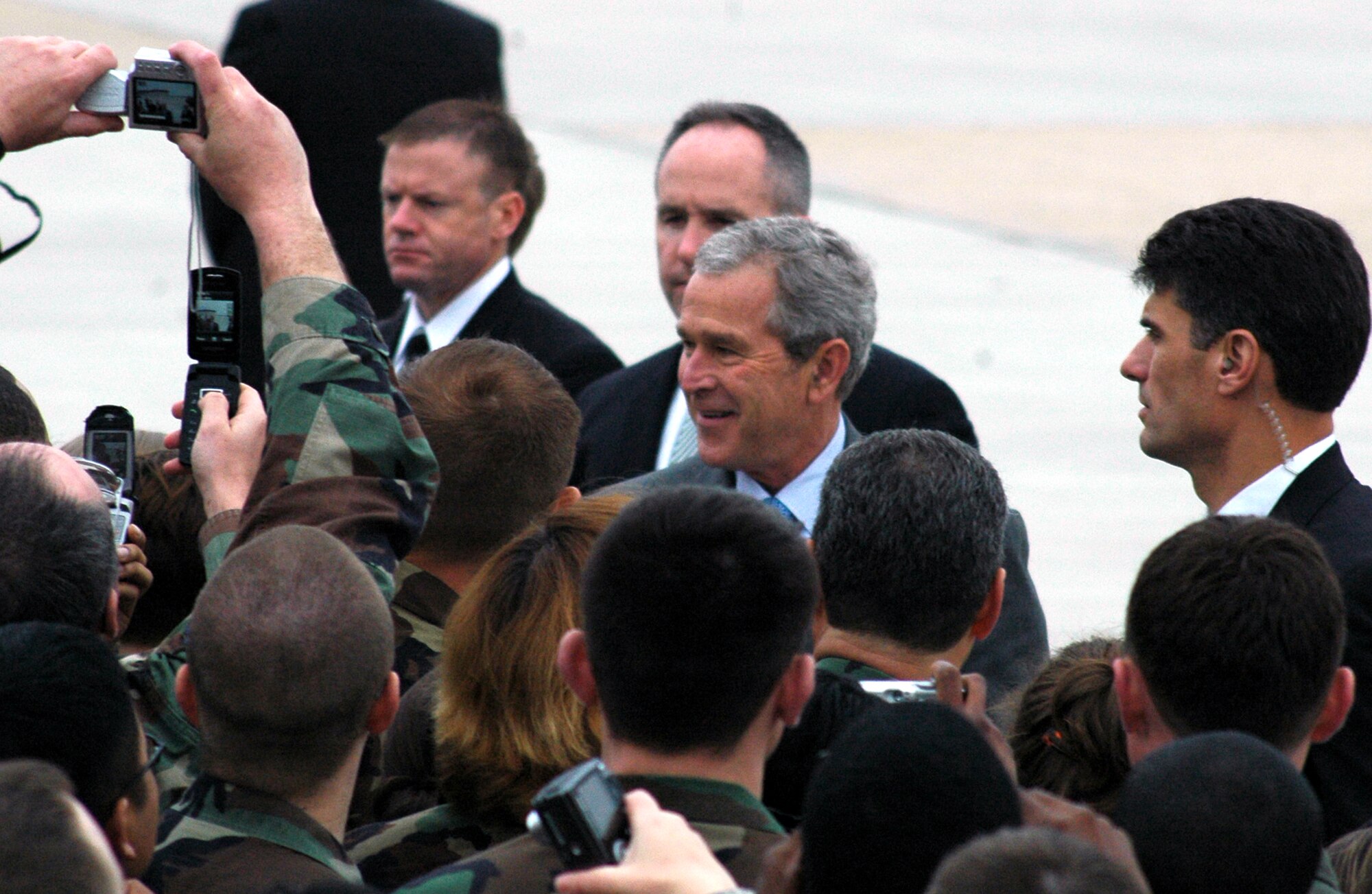 President of the United States George Bush shakes hands and greets Airmen at McGuire Air Force Base, N.J., March 28, 2008.  The President came through McGuire en route to a pre-scheduled visit to Freehold, N.J.  (U.S. Air Force Photo/Tech. Sgt. Scott T. Sturkol)