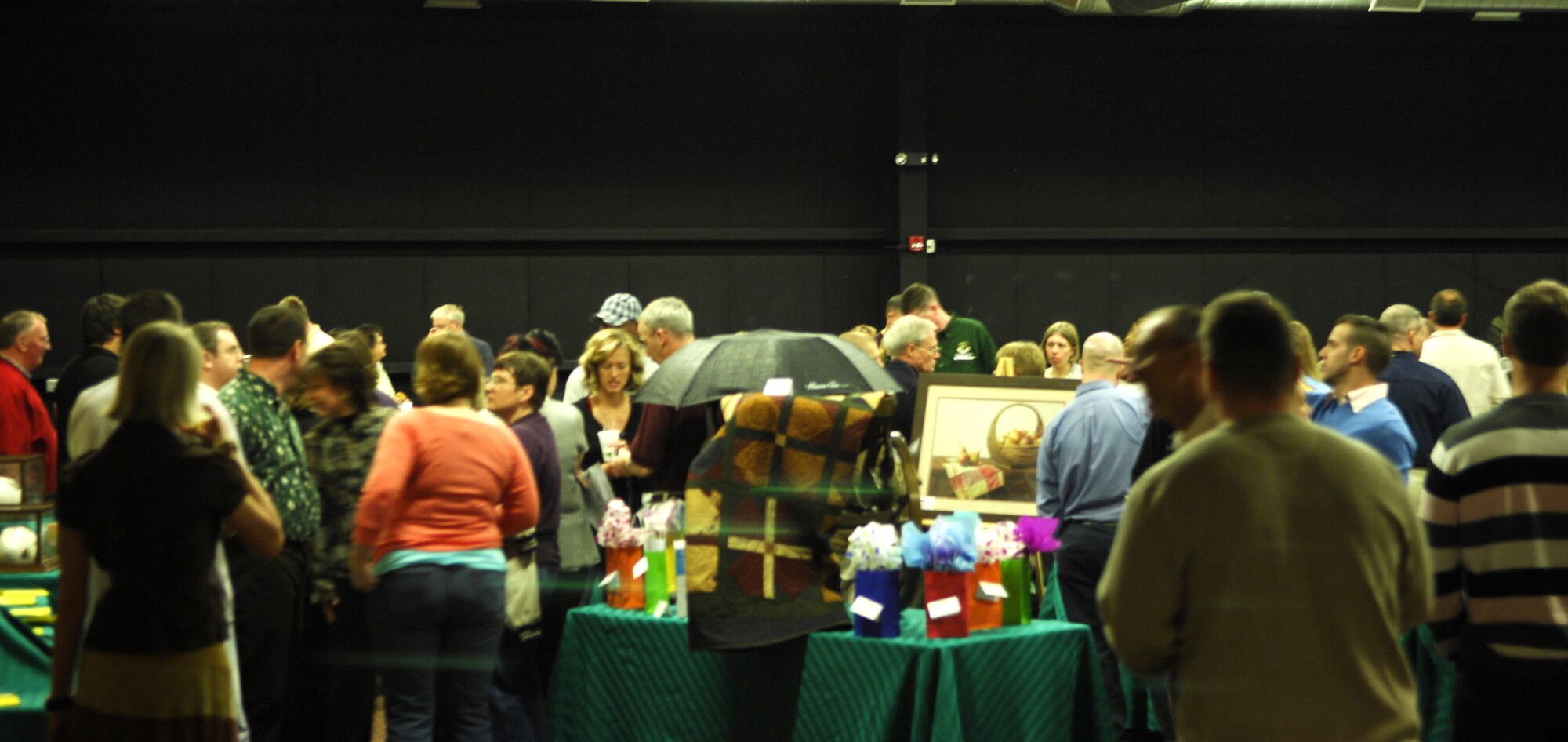MINOT AIR FORCE BASE, N.D. -- Members of the base and local community check out items to be auctioned during the Prairie Warrior Association Auction March 29 at the Holiday Inn in Minot. The auction, which has been an annual event since 1986, raised almost $35,000 for 5th Bomb Wing and 91st Space Wing units. (U.S. Air Force photo by Maj. Elizabeth Ortiz)