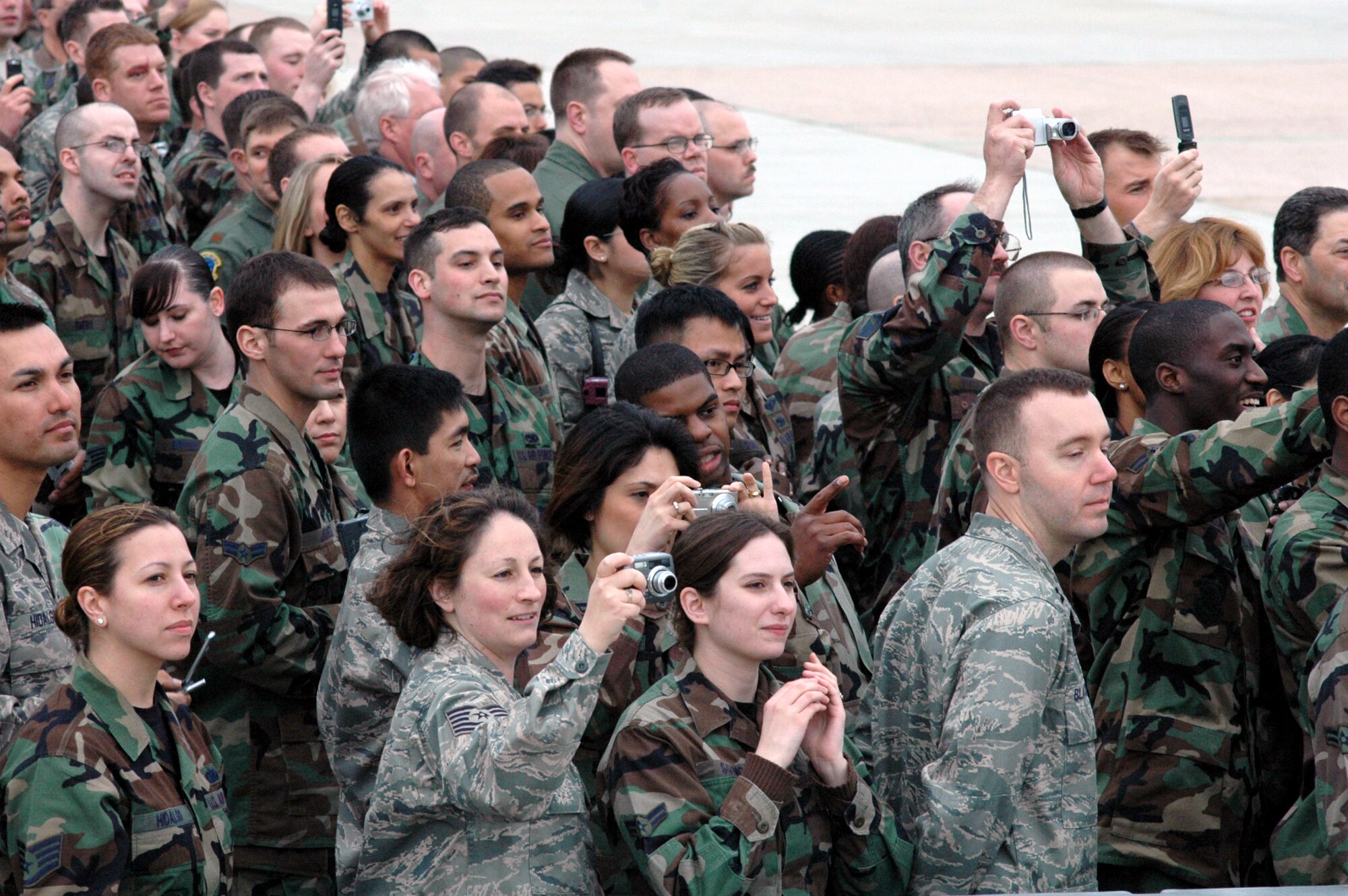 Hundreds of Airmen from McGuire Air Force Base, N.J., and the U.S. Air Force Expeditionary Center on Fort Dix, N.J., wait for President George W. Bush to return from Freehold, N.J., to McGuire March 28, 2008.  The President greeted the Airmen before departing on Air Force One. (U.S. Air Force Photo/Tech. Sgt. Scott T. Sturkol)