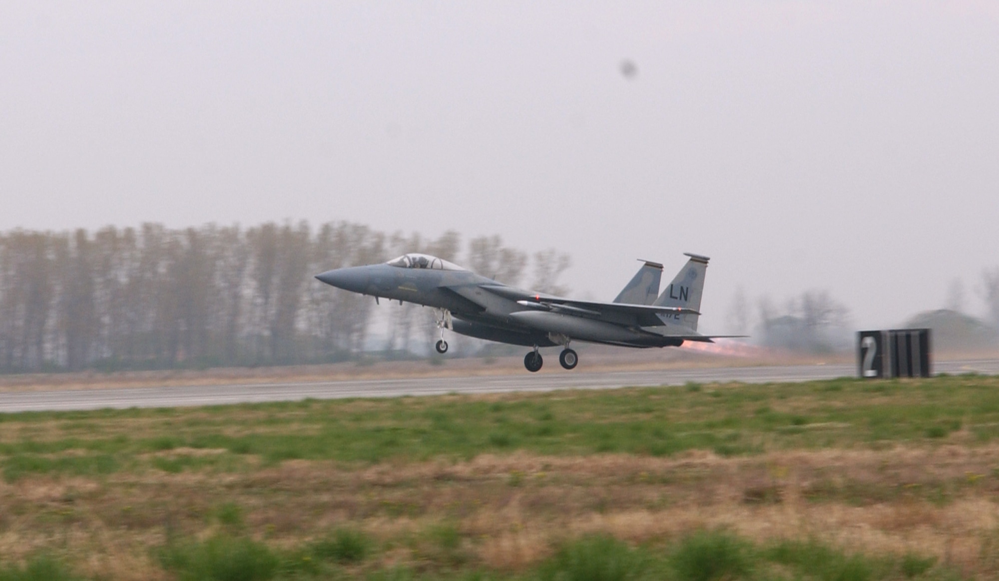 An F-15C Eagle, deployed from RAF Lakenheath, U.K., takes off from an air base in Bulgaria on an air policing mission in support of Operation Noble Endeavor April 1. The U.S., in cooperation with NATO, is providing air combat patrols to secure Romanian sovereign airspace as a deterrent force. (U.S. Air Force photo by Tech. Sgt. J. LaVoie)