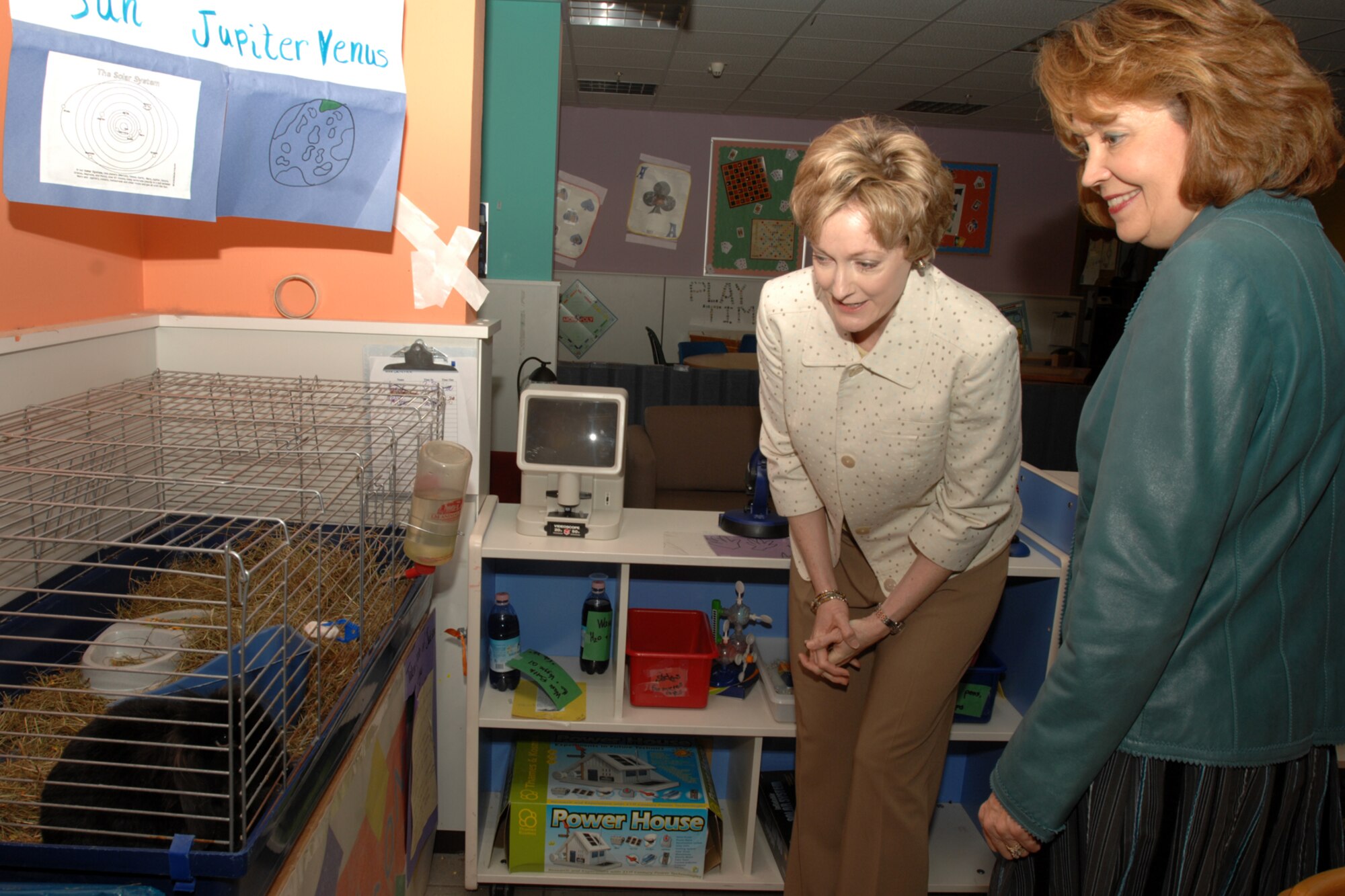SPANGDAHLEM AIR BASE, Germany -- Litha Brady, wife of U.S. Air Forces in Europe Commander Gen. Roger Brady, and Lori Feldhausen, wife of 52nd Fighter Wing Commander Col. Thomas Feldhausen, meet Jackson the rabbit at the Spangdahlem Youth Center March 31, 2008. This was the first visit here for the Brady’s as the COMUSAFE. (U.S. Air Force photo/Airman 1st Class Jenifer Calhoun)