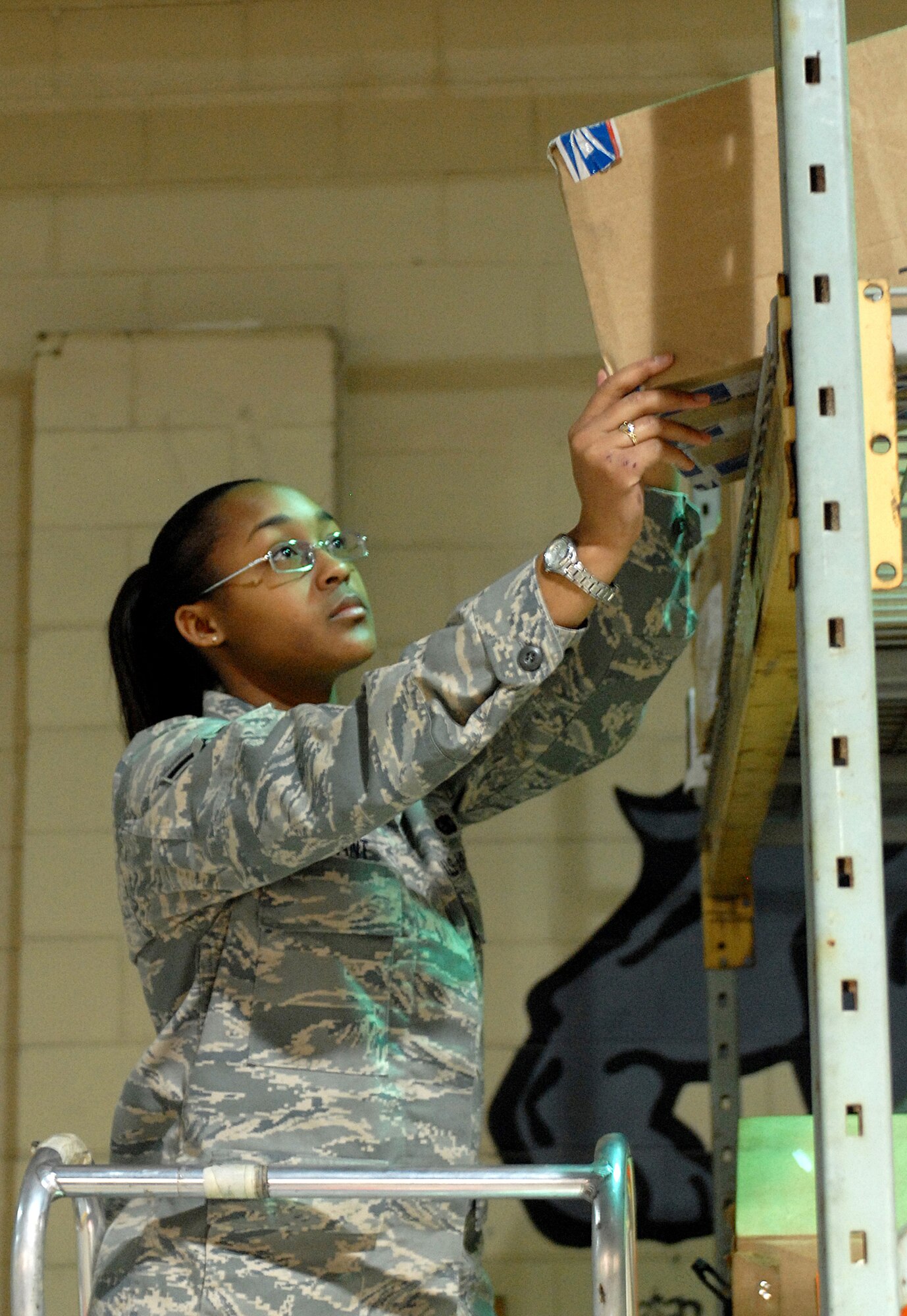 KUNSAN AIR BASE, Republic of Korea -- Airman 1st Class Lynise Bryant, 8th Logistics Readiness Squadron Flight Service Center apprentice, performs inventory inspection here March 27. The Flight Service Center provides aircraft maintenance supplies to ensure aircraft are 100 percent mission ready for the Wolf Pack's three-tier mission. (U.S. Air Force photo/ Senior Airman Giang Nguyen)