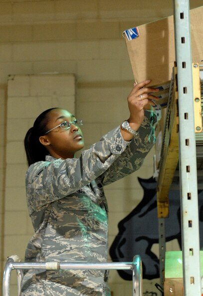 KUNSAN AIR BASE, Republic of Korea -- Airman 1st Class Lynise Bryant, 8th Logistics Readiness Squadron Flight Service Center apprentice, performs inventory inspection here March 27. The Flight Service Center provides aircraft maintenance supplies to ensure aircraft are 100 percent mission ready for the Wolf Pack's three-tier mission. (U.S. Air Force photo/ Senior Airman Giang Nguyen)