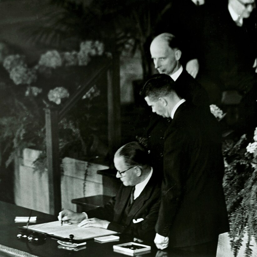 Dirk Stikker, Minister of Foreign Affairs, signs the North Atlantic Treaty for The Netherlands, April 4, 1949.