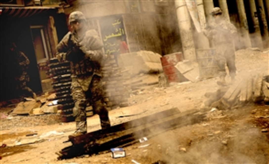 U.S. soldiers patrol the area around Al Fadel Book Market in Baghdad, Iraq, March 27, 2008. The soldiers are from 89th Cavalry Regiment, 4th Brigade Combat Team, 10th Mountain Division.