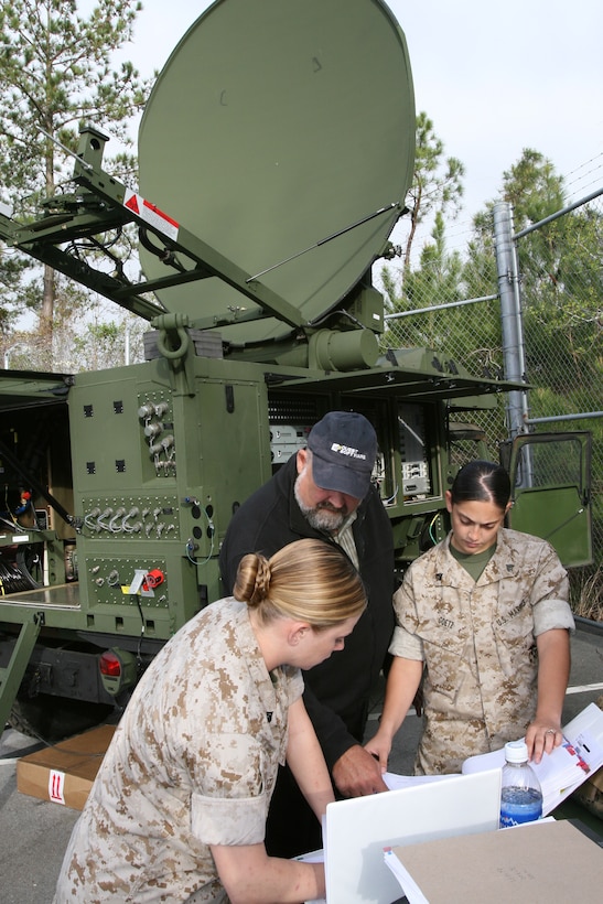 A Mine Resistant and Ambush Protected “Buffalo” vehicle from Reaper platoon, Company A, 2nd Combat Engineer Battalion, Regimental Combat Team 1 creeps down a rural road with its flood lights revealing the ground below, allowing combat engineers to observe for any suspicious objects in their path during a route clearance mission.  The Reapers have successfully cleared nearly 9,000 miles of roads throughout the area of operations at a crawling pace of 10 miles per hour, and discovered six improvised explosive devices during their seven month deployment.