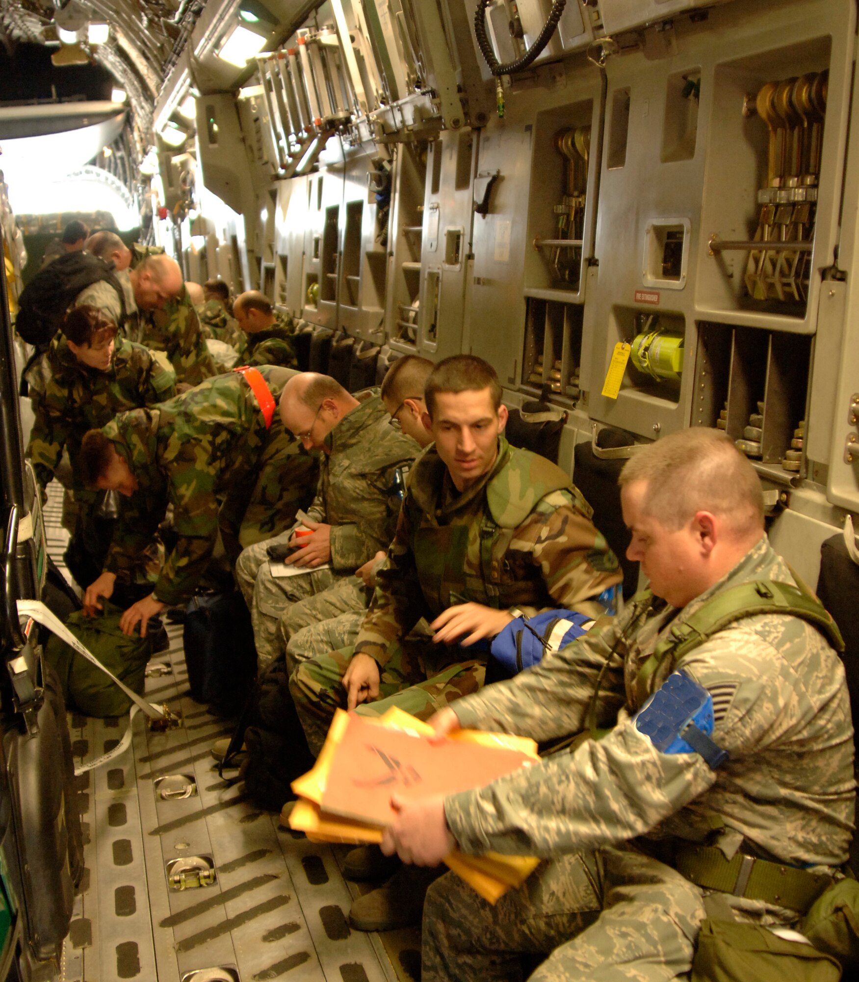 MCCONNELL AIR FORCE BASE, Kan. -- Team McConnell members prepare to depart to Volk Field, Wis. to participate in an Operational Readiness Exercise, March 29,  for an upcoming wing inspection in June. (Photo by Senior Airman Roy Lynch III)