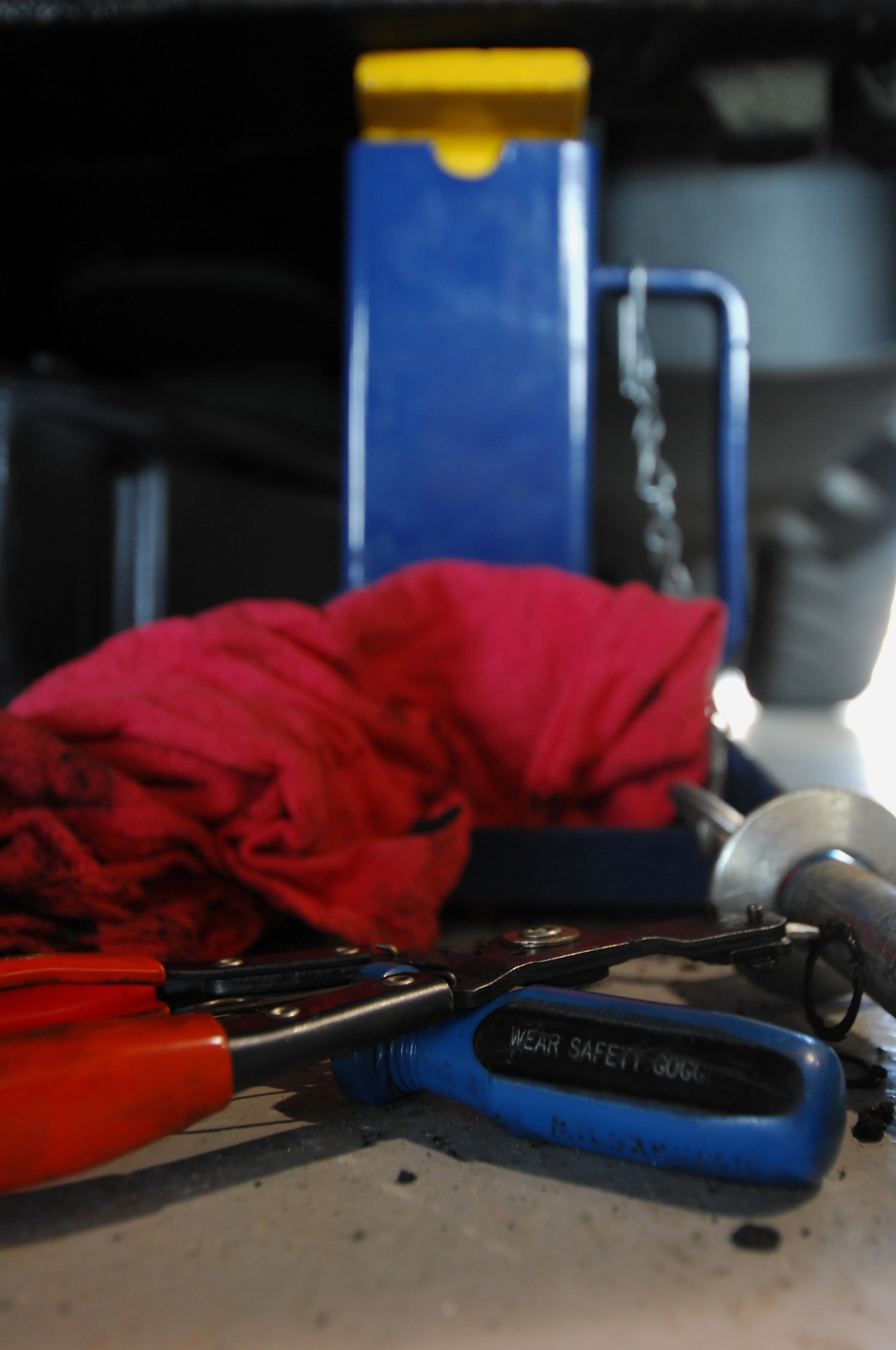 MOODY AIR FORCE BASE, Ga. -- Tools used by the 23rd Logistics Readiness Squadron vehicle maintenance flight lay nearby as Staff Sgt. Robert Styles, vehicle maintenance craftsman, removes a leaking steering cylinder from a forklift here April 2. (U.S. Air Force Photo/Staff Sgt. Joshua T. Jasper) 