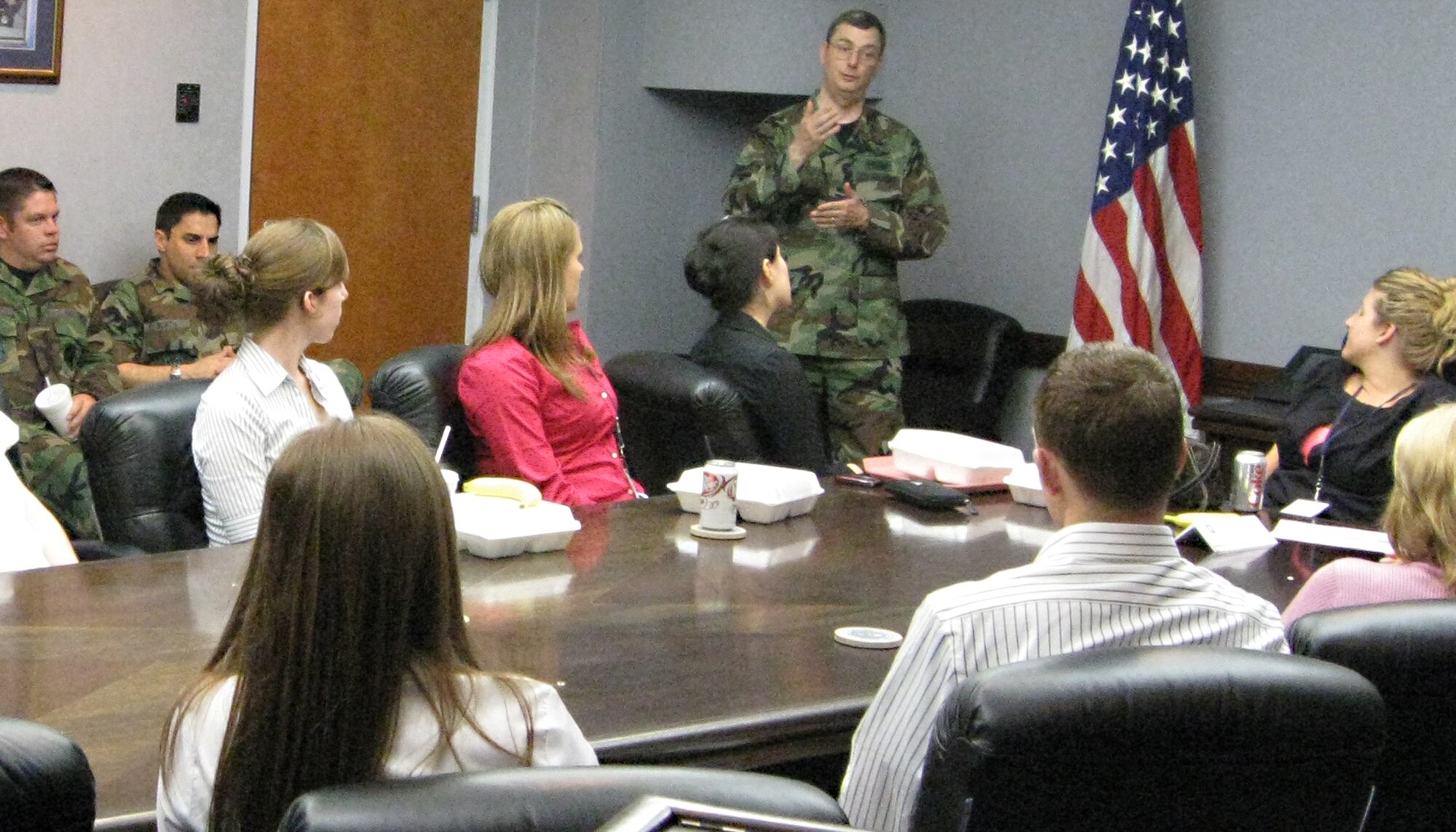 Col. James Heriot speaks with guests of the 339th Recruiting Squadron Fly-Away Health Professions Tour on March 15 about working in an Air Force hospital. The tour gave select doctors, dentists, nurses and medical school students from Michigan a first-hand look at the Air Force experience at Eglin Air Force Base, Fla., March 13-15. (U.S. Air Force photo/Staff Sgt. Nathan Richardson)