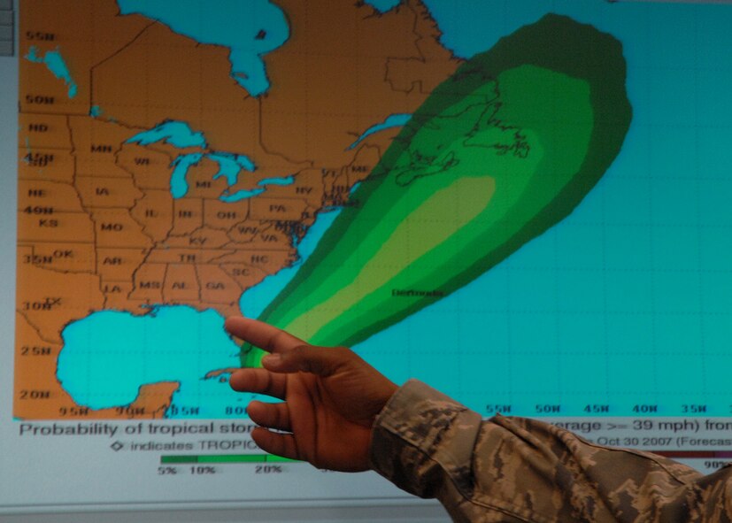 MOODY AIR FORCE BASE, Ga. -- Tech. Sgt. Anthony Slaughter, 347th Operations Support Squadron weather forecaster, points at a Doppler Radar graphic interface showing national weather forecasts here April 2. Tracking weather patterns helps Moody's with mission planning. (U.S. Air Force photo by Airman 1st Class Brittany Barker)