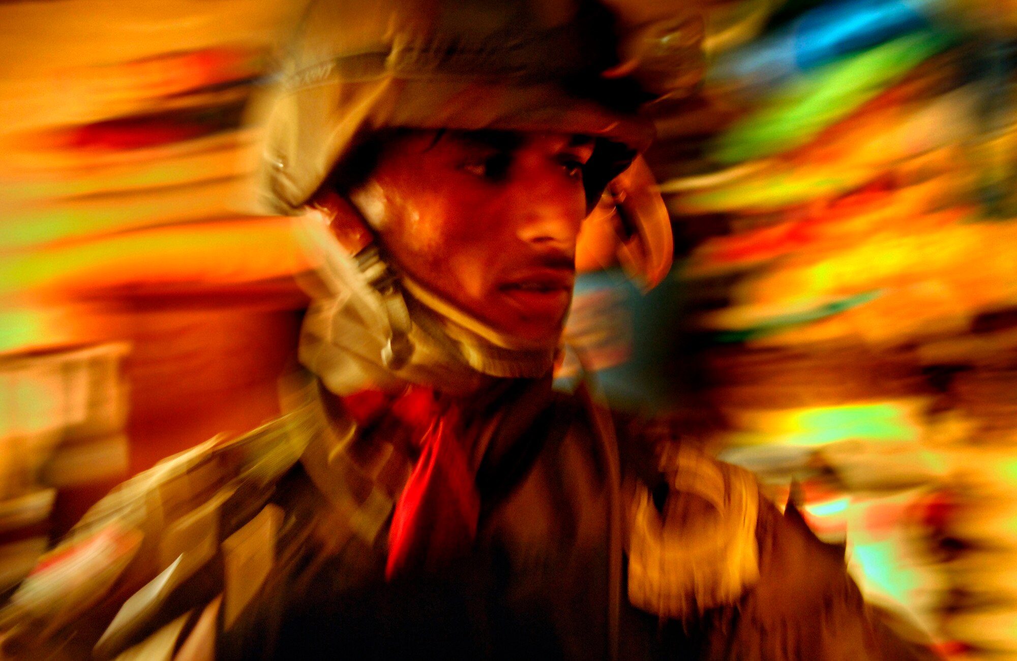 The above photo of an Iraqi army Soldier searches a house for Al-Qaeda forces and illegal weapons in Tahrir, Iraq, Feb. 27, 2007 is one of many photos Sergeant Pearsall submitted for the Department of Defense competition. She placed in five categories and was named the 2007 Military Photographer of the Year. (U.S. Air Force photo/Staff Sgt. Stacy Pearsall)