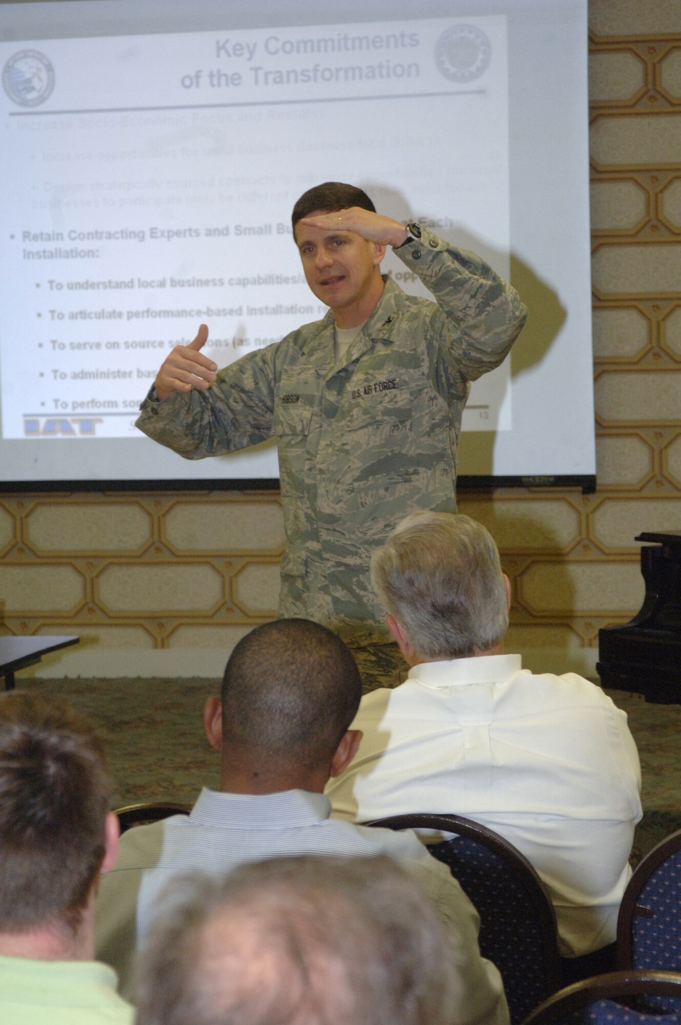 Colonel Mark Hobson, Provisional Director of Installation Acquisition Center, gives the Installation Acquisition Transformation briefing at the Columbus Public Library March 28. (U.S. Air Force photo by Senior Airman John Parie)