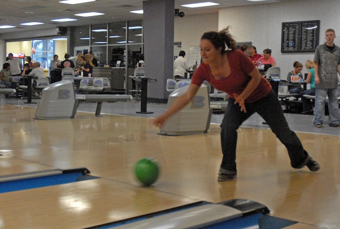 Julie Eberlin bowls at Starlifter Lanes Tuesday as part of the base?s Wingman Day activities. Eberlin is with the 437th Medical Group Dental Clinic. (U. S. Air Force photo/Airman 1st Class Melissa White)