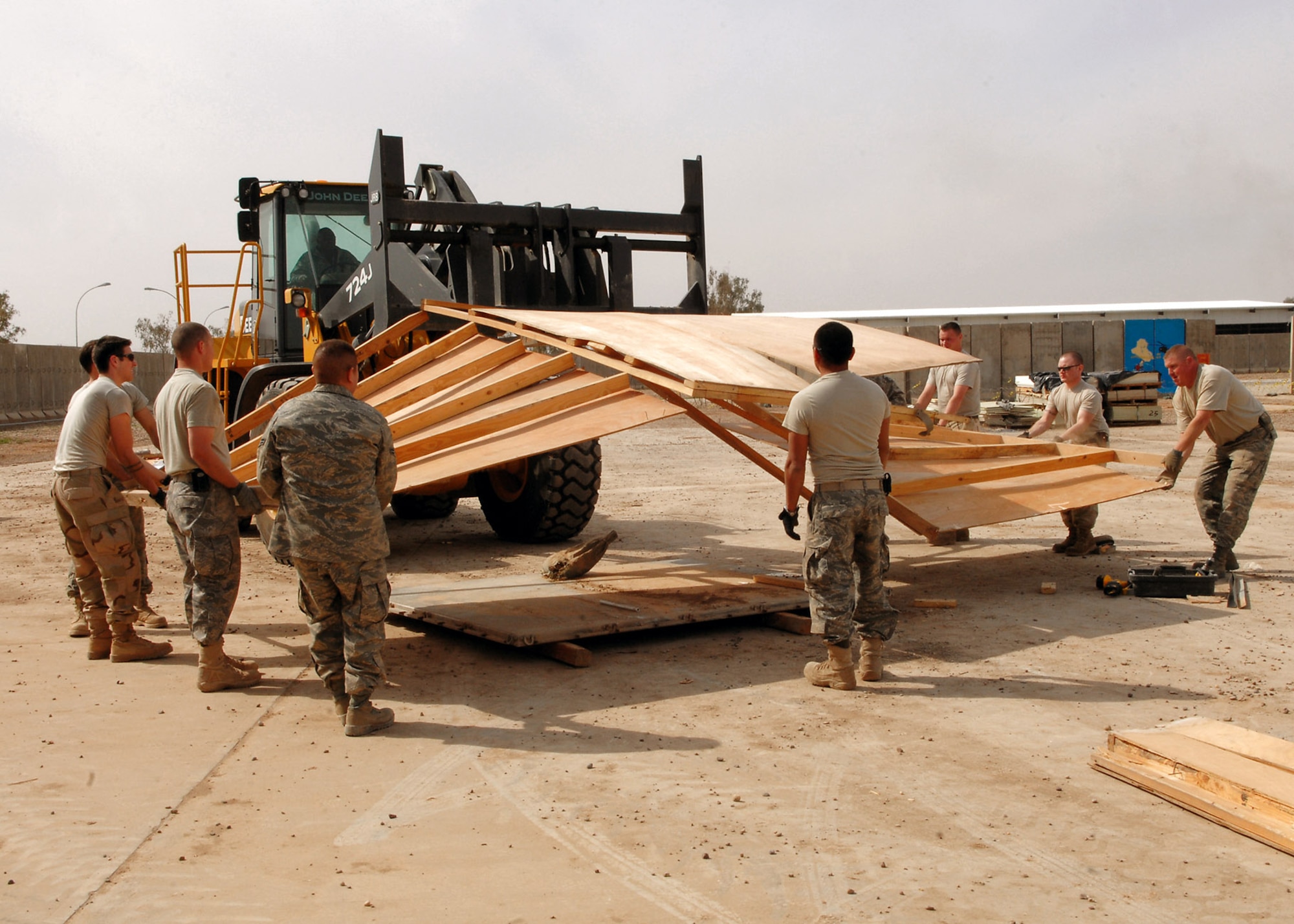 Members of the 332nd Expeditionary Civil Engineer Squadron pull apart the entry way of the old Air Force Theater Hospital emergency room tent Feb. 29 at Balad Air Base, Iraq. The entry will be shipped to the National Museum of Health and Medicine in Washington as part of an exhibit. The tent is slated for exhibition because it is known, by the medical community, as the place where the most American blood was spilled since the Vietnam War. (U.S. Air Force photo/Senior Airman Julianne Showalter) 