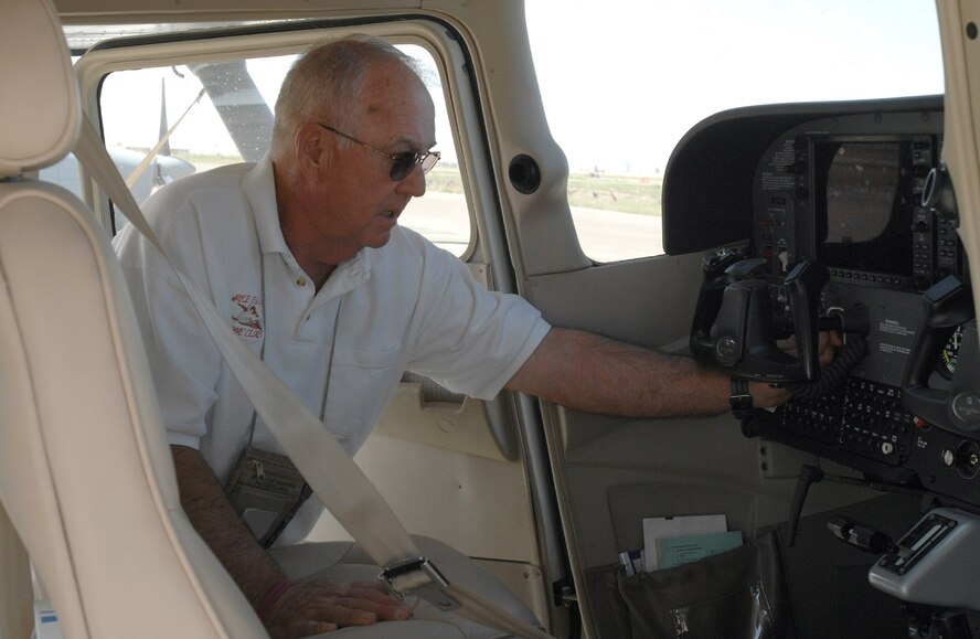 Retired Army Lt. Col. Lott Lawson inspects a Cessna 172 aircraft March 29 Kirkuk Air Base, Iraq. He is a site manager for the maintainence of Iraqi air force aircraft. As coalition forces continue reaching benchmarks to rebuild the Iraqi air force, this former U.S. Army helicopter has helped foreign pilots earn their wings throughout his military and civilian career during training programs in Vietnam, Saudi Arabia and Afghanistan. (U.S. Air Force photo/Senior Airman Eric Schloeffel) 