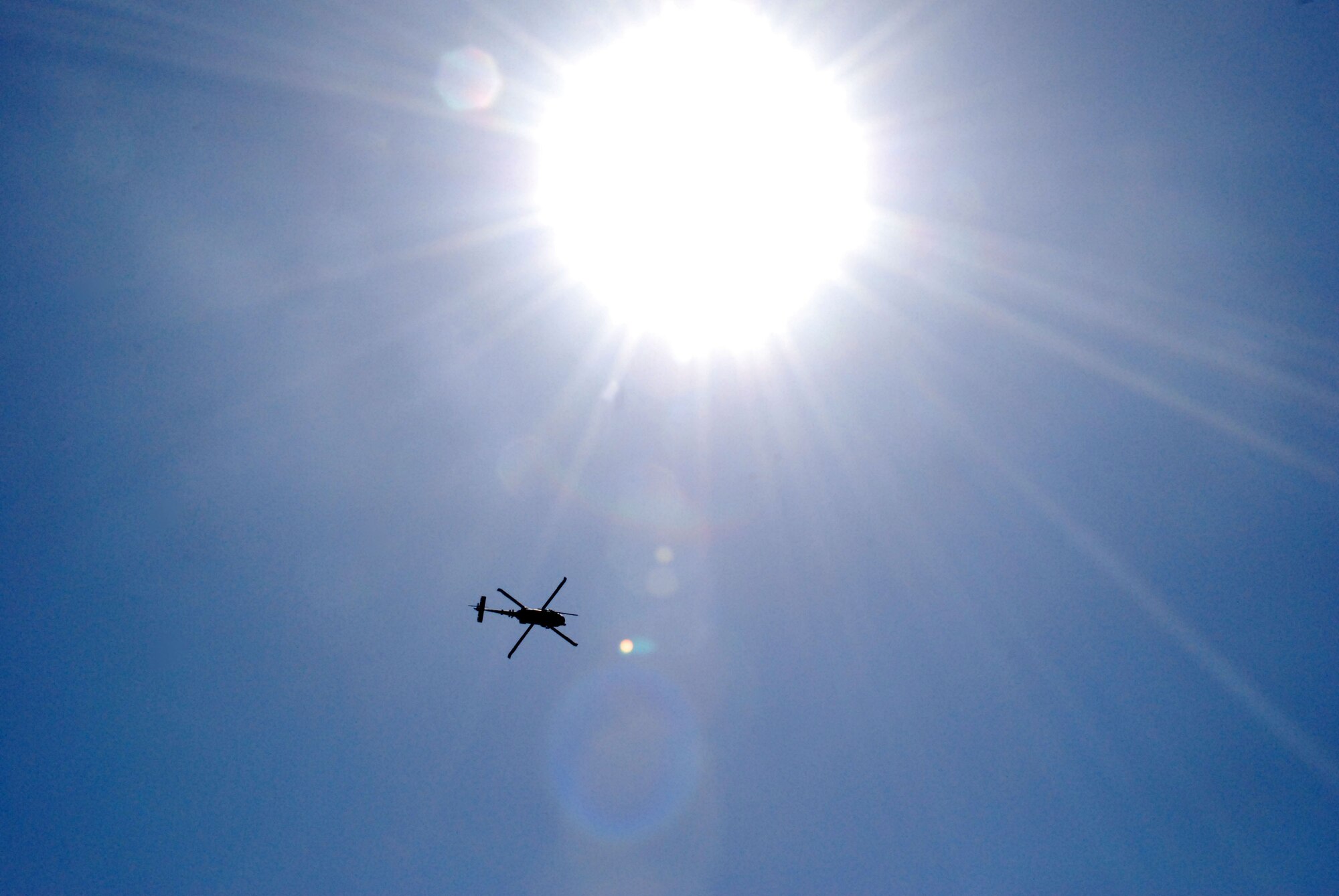 Rescue Reservists from the 920th Rescue Wing fly an HH-60G Pave Hawk helicoter at 4,500 feet above the Banana River which borders Patrick Air Force Base, Fla. to the west.  At that height, the helicopters serve as a jump platform for pararescuemen to hone their freefall skills to perform water rescues.  The portion of the river where they train is called the Judy Drop Zone and is used as a training site for pararescuemen from the wing's 308th Rescue Squadron. (U.S. Air Force Photo/Ms. Jasmine DeNamur)